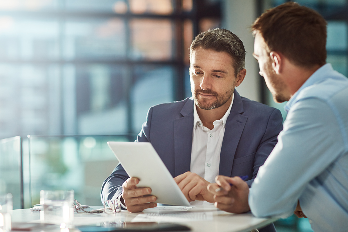 Two people discussing planning